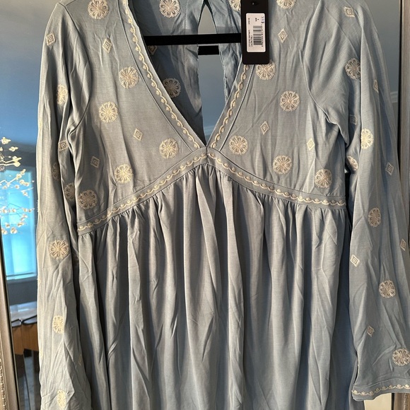 Lush Tops - Brand:Lush NWT... size..Small..very soft baby blue casual top.